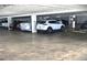 A view of the community parking garage which provides residents with secure and covered parking at 601 N Mcdonald St # 208, Mount Dora, FL 32757
