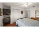 Bedroom with ceiling fan, laminate floors, closet and window to provide natural light at 6022 Wilander St, Leesburg, FL 34748