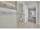 Bathroom showcasing a toilet and a shower with a glass door at 6122 Sailboat Ave, Tavares, FL 32778