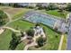 Aerial view of the community pool and surrounding patio area in a well maintained lakeside community at 6122 Sailboat Ave, Tavares, FL 32778