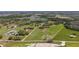Expansive property featuring open pasture, a pond, and mature trees, perfect for a serene country lifestyle at 6813 S Fork Ranch Dr, Clermont, FL 34714