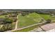 Extensive acreage featuring lush pastures, a serene pond, and picturesque rural landscape at 6813 S Fork Ranch Dr, Clermont, FL 34714
