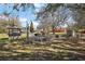 Spacious backyard with multiple seating and cooking areas, perfect for outdoor gatherings at 6813 S Fork Ranch Dr, Clermont, FL 34714