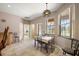 Cozy breakfast nook area with tile floors and view to screened in lanai at 6813 S Fork Ranch Dr, Clermont, FL 34714