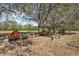 Functional chicken coop and run providing a safe and productive environment at 6813 S Fork Ranch Dr, Clermont, FL 34714