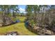 Picturesque landscape with scattered trees and clear stream running through at 6813 S Fork Ranch Dr, Clermont, FL 34714
