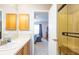 Bathroom with walk-in shower and access to bedroom at 773 Artesia Ave, The Villages, FL 32162