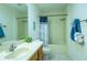 Bathroom featuring a shower/tub combo, vanity and ample natural light at 773 Artesia Ave, The Villages, FL 32162