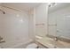 Bright, clean bathroom with shower/tub combo, vanity, and tiled floor at 776 Alcott Ave, The Villages, FL 32162