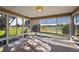 Enclosed sunroom with many windows and a great view at 776 Alcott Ave, The Villages, FL 32162