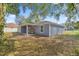 Picture of the backyard featuring a covered patio and a view of the home at 804 Deep Wood Ct, Fruitland Park, FL 34731