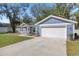 Charming single-story home with a well-manicured lawn, a two-car garage, and attractive curb appeal at 804 Deep Wood Ct, Fruitland Park, FL 34731