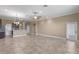 Bright and spacious living area with tile floors and neutral color scheme at 1017 Green Gate Blvd, Groveland, FL 34736