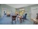 Inviting living room features a traditional layout with comfortable seating and access to other areas of the home at 1033 Scotch Pine Ct, Leesburg, FL 34788