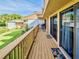 This wide balcony offers lovely views, space for seating, and access from sliding glass doors, enhancing the property's appeal at 1051 S Highland St # 7E, Mount Dora, FL 32757