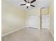 Spacious bedroom with closet and adjacent door at 10929 Se 167Th Pl, Summerfield, FL 34491