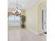 Bright dining room featuring large windows and neutral walls, ready for memorable gatherings at 10929 Se 167Th Pl, Summerfield, FL 34491