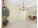 Open dining area with tile flooring and natural light, seamlessly connected to the kitchen at 10929 Se 167Th Pl, Summerfield, FL 34491