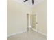A bright room featuring tile floors, neutral walls, and french doors at 10929 Se 167Th Pl, Summerfield, FL 34491