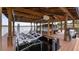 Boat lift featuring a pontoon boat, providing convenient lake access and storage at 11007 Lake Katherine Cir, Clermont, FL 34711