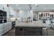 Elegant kitchen featuring granite countertops, custom cabinetry, and stainless steel appliances at 11007 Lake Katherine Cir, Clermont, FL 34711