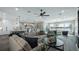 Open-concept living room with a view, showcasing modern furnishings and stylish decor at 11007 Lake Katherine Cir, Clermont, FL 34711