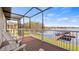 Relaxing screened patio with lake view at 11007 Lake Katherine Cir, Clermont, FL 34711