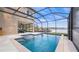 Stunning lake view from the screened-in pool and patio area at 11007 Lake Katherine Cir, Clermont, FL 34711