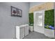 Inviting front entrance with decorative planters and modern accents at 11396 Se 178Th Pl, Summerfield, FL 34491
