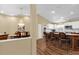 Elegant kitchen and dining area featuring a breakfast bar, and classic furnishings at 11396 Se 178Th Pl, Summerfield, FL 34491