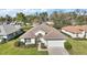 Charming single-Gathering home with a well-kept lawn, complemented by lush landscaping and a welcoming two-car garage at 11684 Sw 72Nd Cir, Ocala, FL 34476