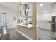 Open-concept kitchen with a central island, stainless steel appliances, and modern lighting at 11684 Sw 72Nd Cir, Ocala, FL 34476