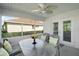Inviting screened lanai with views of the backyard at 11684 Sw 72Nd Cir, Ocala, FL 34476