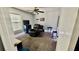 Bedroom with comfortable reclining chair and fun blue accents at 11727 Pineloch Loop, Clermont, FL 34711