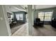 Inviting living room with a dining area, large window, and ample natural light at 11727 Pineloch Loop, Clermont, FL 34711