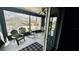 Relaxing screened porch with comfortable seating, ceiling fan, and backyard view at 11727 Pineloch Loop, Clermont, FL 34711