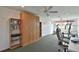Basement featuring a Murphy bed, shelving and exercise equipment at 1229 Augustine Dr, The Villages, FL 32159
