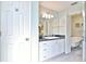 Bathroom with vanity, mirror and lighting and view of separate claw foot bathtub at 1229 Augustine Dr, The Villages, FL 32159