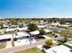Scenic aerial view shows the layout of this expansive mobile home park, near waterfront and with ample trees and landscaping at 1340 Elkhart Cir, Tavares, FL 32778