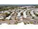 Community aerial view of single Gathering homes with nearby lake view and surrounding landscape at 1340 Elkhart Cir, Tavares, FL 32778