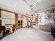 Unfinished basement space, ready for customization, with a window for natural light and potential for storage at 1340 Elkhart Cir, Tavares, FL 32778