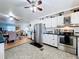 Open kitchen layout, blending seamlessly with the dining and living areas for easy entertaining at 1340 Elkhart Cir, Tavares, FL 32778