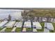 Aerial view of lakeside property with homes and boat docks, near lake and green spaces at 1401 W Highway 50 # 173, Clermont, FL 34711
