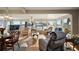 Inviting living room with waterfront views, comfortable seating, and abundant natural light at 1401 W Highway 50 # 173, Clermont, FL 34711