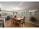 Elegant dining and living area featuring water views, ample seating, and natural light at 1401 W Highway 50 # 173, Clermont, FL 34711
