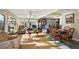 Sunlit living room featuring comfortable seating, warm lighting, and open floor plan at 1401 W Highway 50 # 173, Clermont, FL 34711