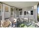 Charming porch seating with a table, offering an inviting outdoor space at 1401 W Highway 50 # 173, Clermont, FL 34711
