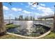 Waterfront property showcasing a covered dock along the tranquil water's edge with lush vegetation at 1401 W Highway 50 # 173, Clermont, FL 34711