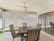 Covered patio with outdoor seating perfect for relaxing or entertaining guests at 1487 Gantt St, The Villages, FL 32162