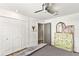 Comfortable bedroom features built-in closet and a decorative dresser at 1494 Grace Lake Cir, Longwood, FL 32750